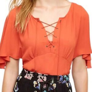Anthropologie HD in Paris flutter sleeve blouse Orange Lace-Up Blouse 6
